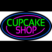 Block Cupcake Shop With Blue Round Neon Skilt